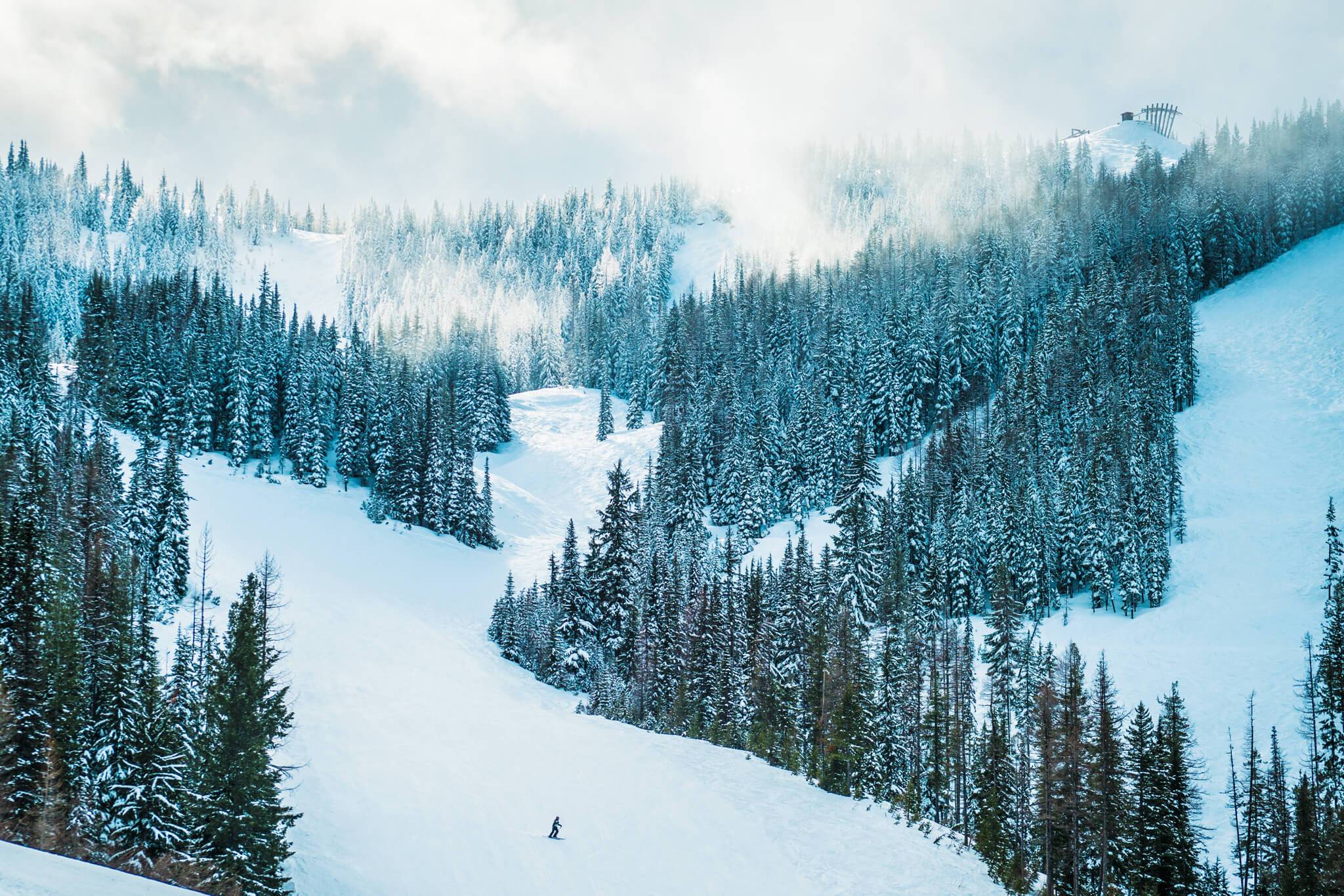 A person skis down a run at Silver Mountain Resort.